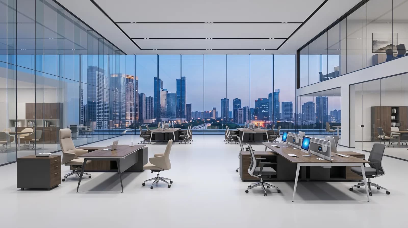 An open-plan office at dusk behind floor-to-ceiling glazing, with executive desks, mesh and leather task chairs and bench workstations facing a lit city skyline.